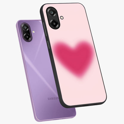 Pink Aura Heart Glass Case displayed in angled mockup highlighting vibrant pink heart design with dreamy aura aesthetic.