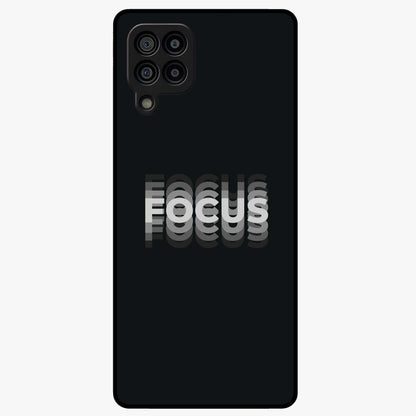 Focus Mode On Glass Case showing flat back view with bold motivational typography design and glossy glass finish.