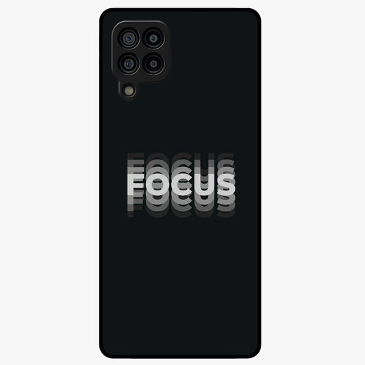 Focus Mode On Glass Case showing flat back view with bold motivational typography design and glossy glass finish.