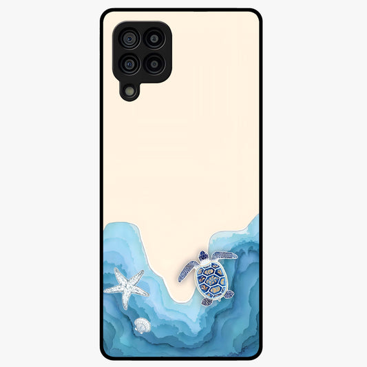 Ocean Drift Turtle Glass Case showing flat back view with sea turtle artwork and glossy glass finish.