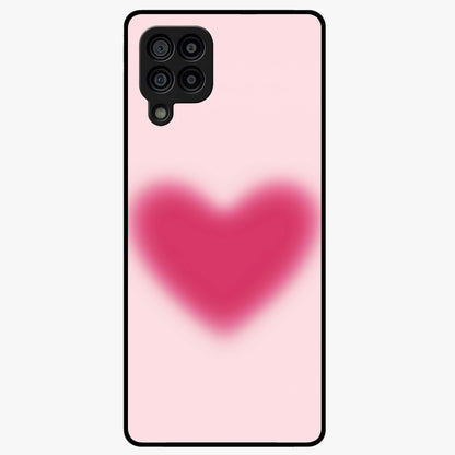 Pink Aura Heart Glass Case showing flat back view with glowing heart artwork and glossy glass finish.