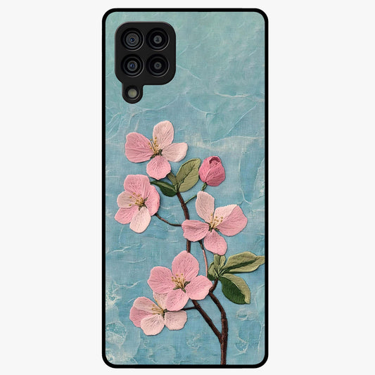 Threaded Blossom Breeze Glass Case showing flat back view with delicate blossom artwork and glossy glass finish.