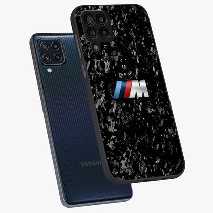 Carbon Speed Mark Glass Case displayed in angled mockup highlighting racing inspired carbon design and sleek aesthetic style.