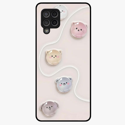 Puffy Face Parade Glass Case showing flat back view with cute puffy character faces artwork and glossy glass finish.