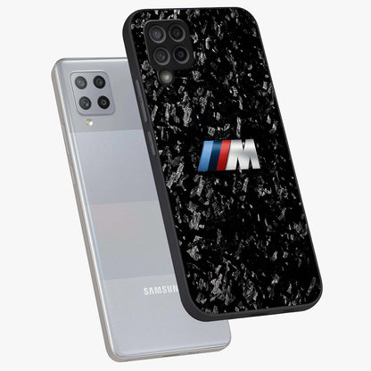 Carbon Speed Mark Glass Case displayed in angled mockup highlighting racing inspired carbon design and sleek aesthetic style.