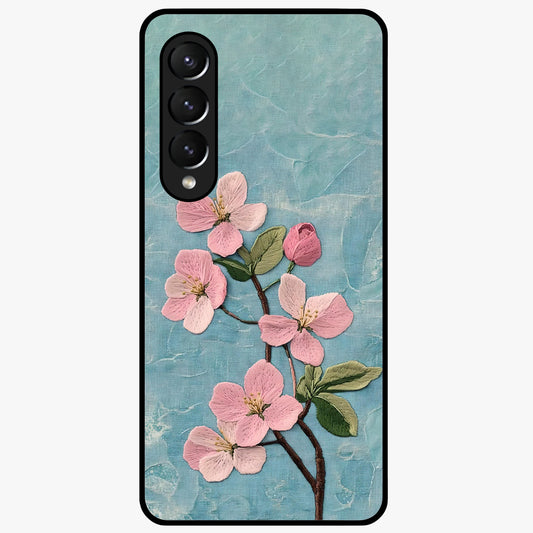 Threaded Blossom Breeze Glass Case showing flat back view with delicate blossom artwork and glossy glass finish.