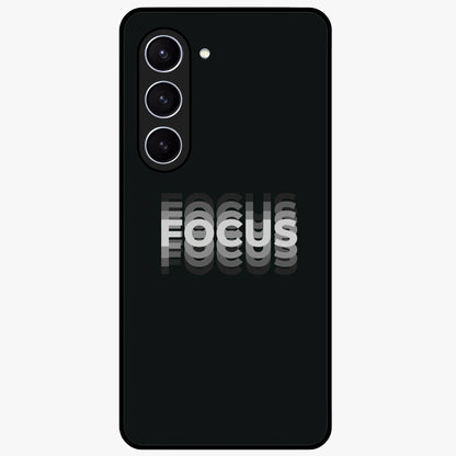Focus Mode On Glass Case showing flat back view with bold motivational typography design and glossy glass finish.
