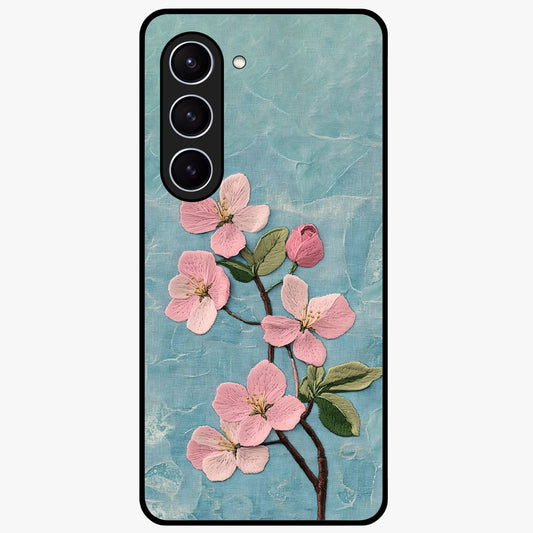 Threaded Blossom Breeze Glass Case showing flat back view with delicate blossom artwork and glossy glass finish.
