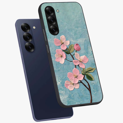 Threaded Blossom Breeze Glass Case displayed in angled mockup highlighting elegant floral design with soft aesthetic style.