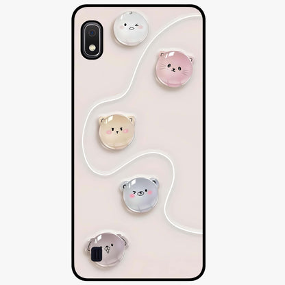 Puffy Face Parade Glass Case showing flat back view with cute puffy character faces artwork and glossy glass finish.