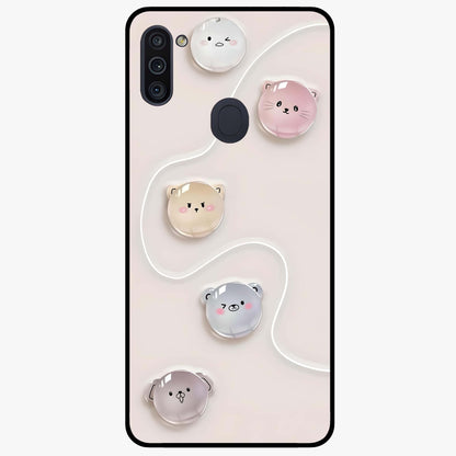 Puffy Face Parade Glass Case showing flat back view with cute puffy character faces artwork and glossy glass finish.