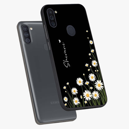 Daisy Cascade Custom Name Glass Case displayed in angled mockup highlighting delicate daisy artwork with custom name feature.