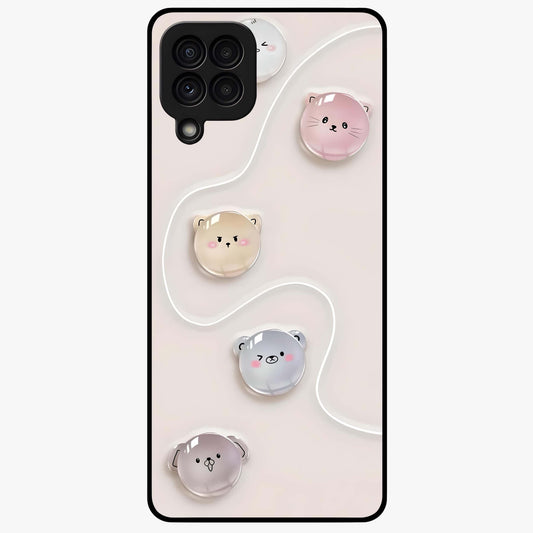 Puffy Face Parade Glass Case showing flat back view with cute puffy character faces artwork and glossy glass finish.