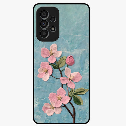 Threaded Blossom Breeze Glass Case showing flat back view with delicate blossom artwork and glossy glass finish.