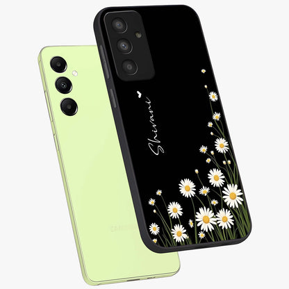 Daisy Cascade Custom Name Glass Case displayed in angled mockup highlighting delicate daisy artwork with custom name feature.