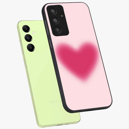 Pink Aura Heart Glass Case displayed in angled mockup highlighting vibrant pink heart design with dreamy aura aesthetic.