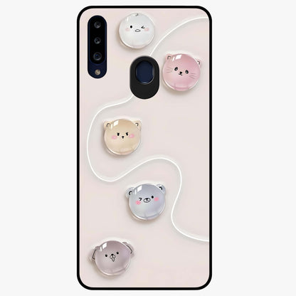 Puffy Face Parade Glass Case showing flat back view with cute puffy character faces artwork and glossy glass finish.