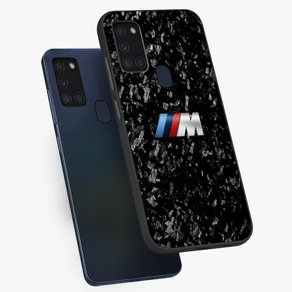 Carbon Speed Mark Glass Case displayed in angled mockup highlighting racing inspired carbon design and sleek aesthetic style.