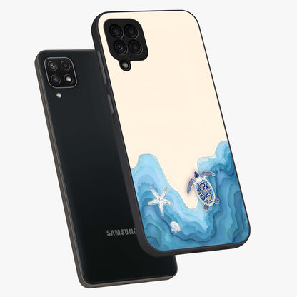 Ocean Drift Turtle Glass Case displayed in angled mockup highlighting peaceful ocean turtle illustration with marine aesthetic.