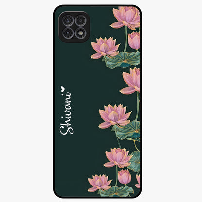 Lotus Bloom Serenity Custom Name Glass Case showing flat back view with elegant lotus flower artwork and personalized name design.