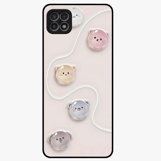 Puffy Face Parade Glass Case showing flat back view with cute puffy character faces artwork and glossy glass finish.