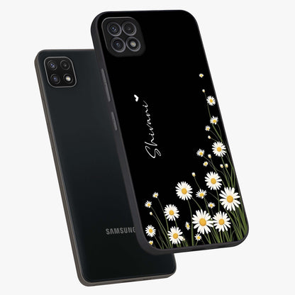 Daisy Cascade Custom Name Glass Case displayed in angled mockup highlighting delicate daisy artwork with custom name feature.