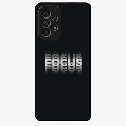 Focus Mode On Glass Case showing flat back view with bold motivational typography design and glossy glass finish.
