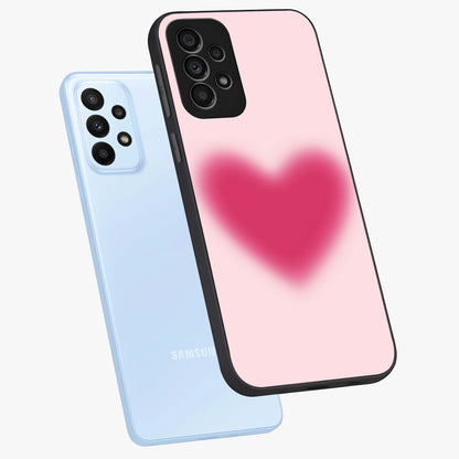 Pink Aura Heart Glass Case displayed in angled mockup highlighting vibrant pink heart design with dreamy aura aesthetic.