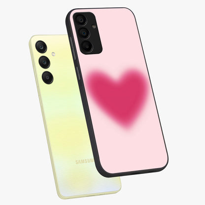 Pink Aura Heart Glass Case displayed in angled mockup highlighting vibrant pink heart design with dreamy aura aesthetic.