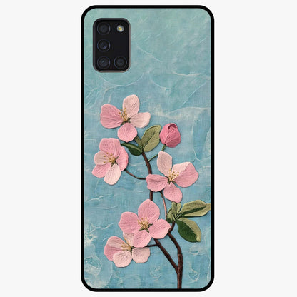 Threaded Blossom Breeze Glass Case showing flat back view with delicate blossom artwork and glossy glass finish.