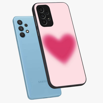 Pink Aura Heart Glass Case displayed in angled mockup highlighting vibrant pink heart design with dreamy aura aesthetic.