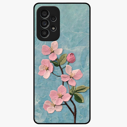 Threaded Blossom Breeze Glass Case showing flat back view with delicate blossom artwork and glossy glass finish.