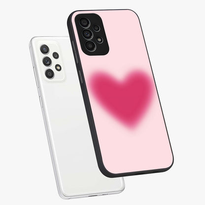 Pink Aura Heart Glass Case displayed in angled mockup highlighting vibrant pink heart design with dreamy aura aesthetic.