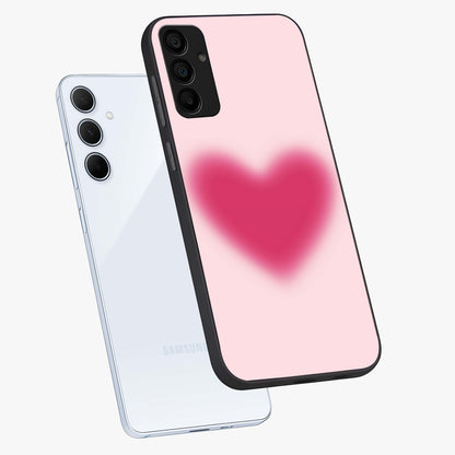 Pink Aura Heart Glass Case displayed in angled mockup highlighting vibrant pink heart design with dreamy aura aesthetic.