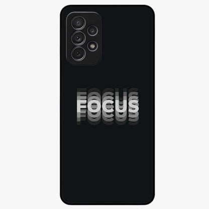 Focus Mode On Glass Case showing flat back view with bold motivational typography design and glossy glass finish.