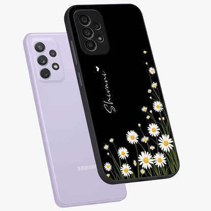 Daisy Cascade Custom Name Glass Case displayed in angled mockup highlighting delicate daisy artwork with custom name feature.