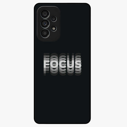 Focus Mode On Glass Case showing flat back view with bold motivational typography design and glossy glass finish.