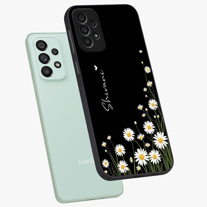 Daisy Cascade Custom Name Glass Case displayed in angled mockup highlighting delicate daisy artwork with custom name feature.