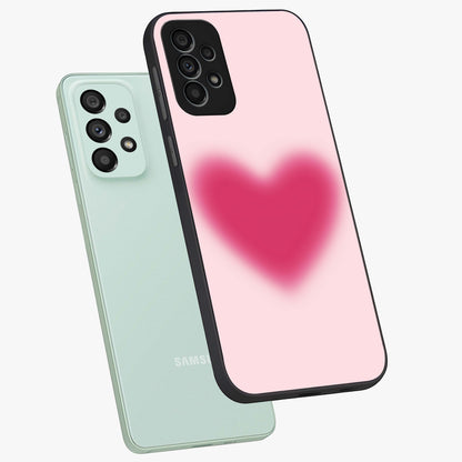Pink Aura Heart Glass Case displayed in angled mockup highlighting vibrant pink heart design with dreamy aura aesthetic.