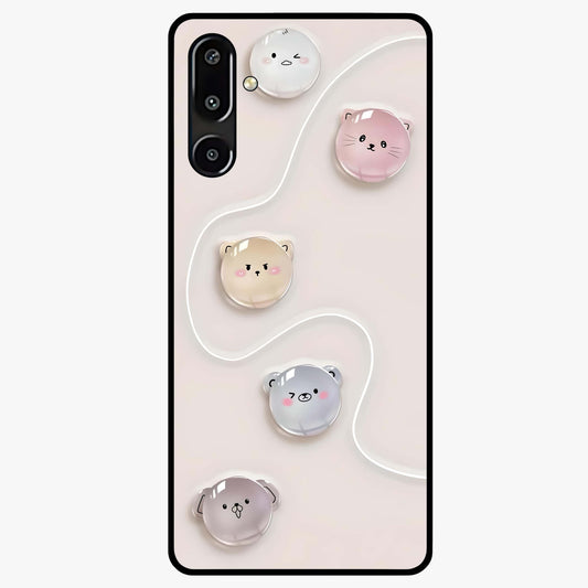 Puffy Face Parade Glass Case showing flat back view with cute puffy character faces artwork and glossy glass finish.