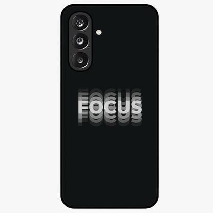 Focus Mode On Glass Case showing flat back view with bold motivational typography design and glossy glass finish.