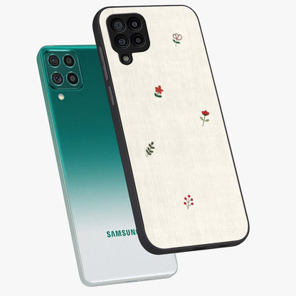 Minimalistic Blue With White Flower Pattern Glass Case displayed in angled mockup highlighting simple floral design with minimal aesthetic.