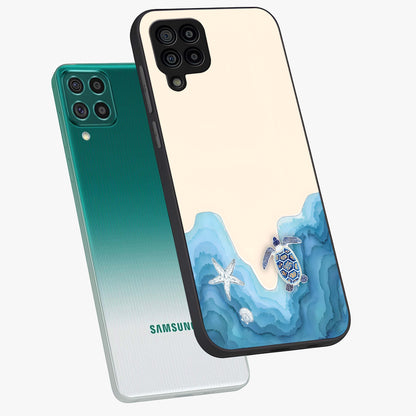 Ocean Drift Turtle Glass Case displayed in angled mockup highlighting peaceful ocean turtle illustration with marine aesthetic.