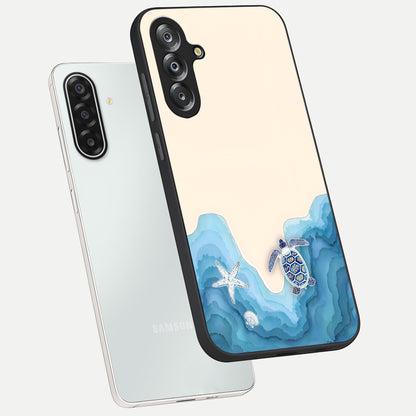 Ocean Drift Turtle Glass Case displayed in angled mockup highlighting peaceful ocean turtle illustration with marine aesthetic.