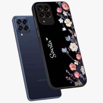 Black Elegance Floral Custom Name Glass Case displayed in angled mockup highlighting dark floral aesthetic and custom name feature.