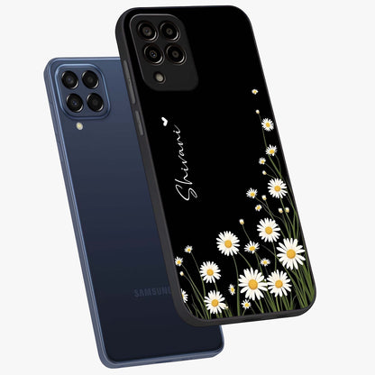 Daisy Cascade Custom Name Glass Case displayed in angled mockup highlighting delicate daisy artwork with custom name feature.