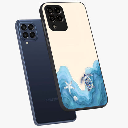 Ocean Drift Turtle Glass Case displayed in angled mockup highlighting peaceful ocean turtle illustration with marine aesthetic.