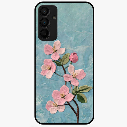 Threaded Blossom Breeze Glass Case showing flat back view with delicate blossom artwork and glossy glass finish.