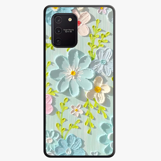 Frosted Petal Garden Glass Case showing flat back view with soft frosted floral artwork and glossy glass finish.