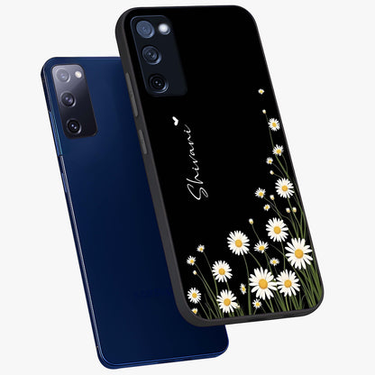 Daisy Cascade Custom Name Glass Case displayed in angled mockup highlighting delicate daisy artwork with custom name feature.